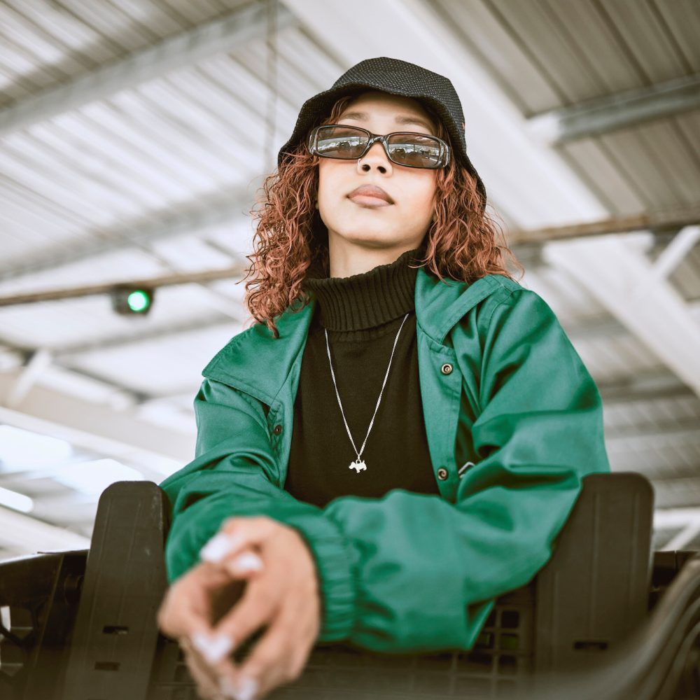 youth-fashion-and-black-woman-in-sunglasses-city-outdoor-shopping-mall-or-urban-bridge-and-portrai.jpg